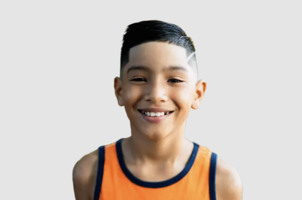 Hispanic Boy Haircut Fade Hardline Lineup Pasadena Young Hispanic boy with fade haircut, hardline, and sharp lineup at The Great Bear Cut kids salon in Pasadena